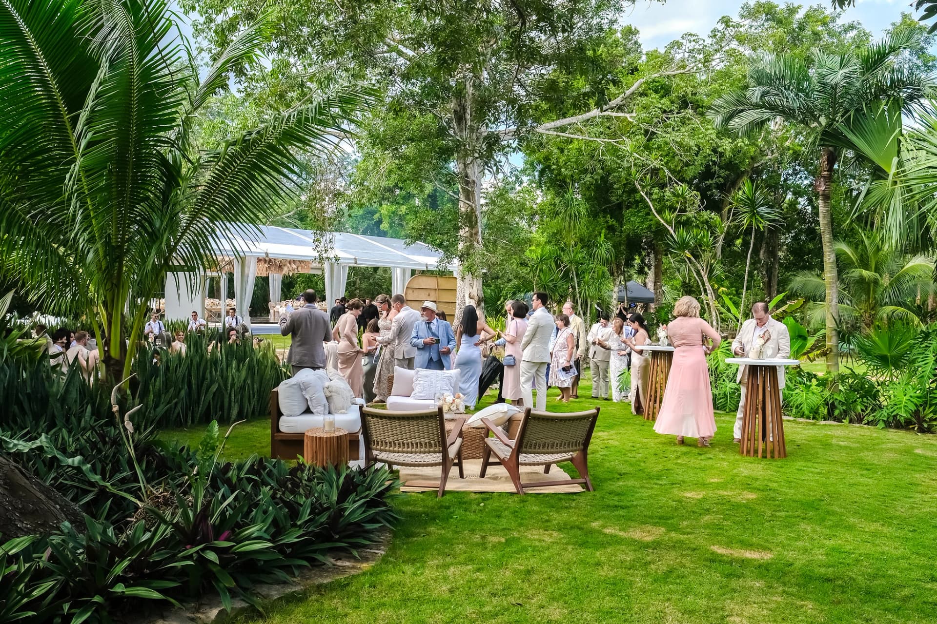 Cocktail hour in the garden at Onze Xpuha, multi-night Wedding Weekend
